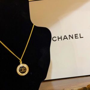 Authentic Chanel button on a 10k gold plated chain